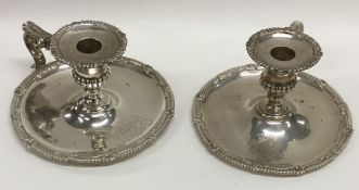 A rare pair of William IV silver chamber sticks wi