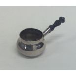 A novelty miniature silver brandy pan on turned wo