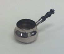 A novelty miniature silver brandy pan on turned wo