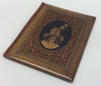 An Antique Continental olive wood book mount. Est.