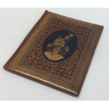 An Antique Continental olive wood book mount. Est.