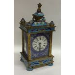 A brass mounted and enamelled carriage clock decor