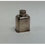 An Antique silver miniature tea caddy with cut cor