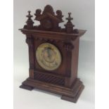 An Edwardian mahogany mantle clock with brass moun