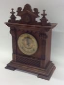 An Edwardian mahogany mantle clock with brass moun