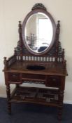 A Continental dressing table on turned supports wi