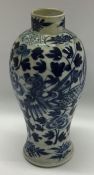 A Chinese baluster shaped blue and white vase deco
