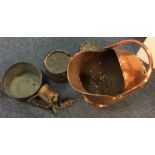 An old copper coal scuttle together with a brass b