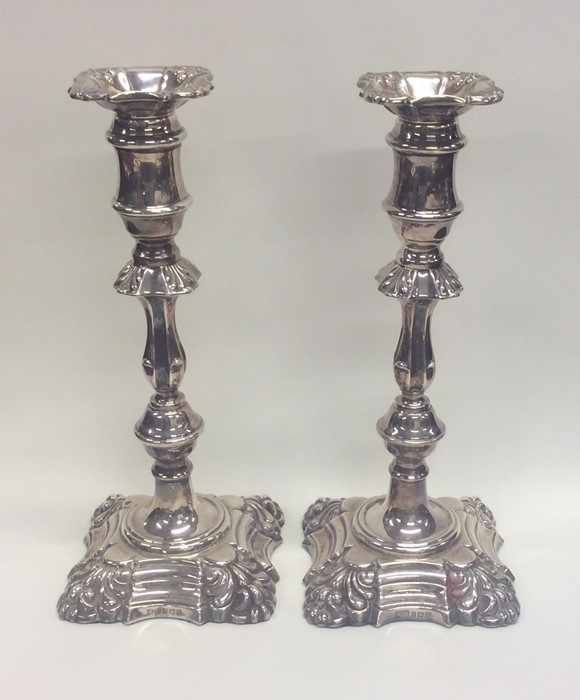 A good pair of Georgian style candlesticks with sc