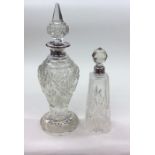 A tall glass and silver mounted scent bottle and s