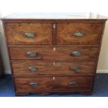 A Georgian flame mahogany four drawer secretaire c