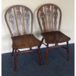 A pair of Antique yew wood stick back chairs. Est.