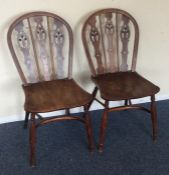 A pair of Antique yew wood stick back chairs. Est.