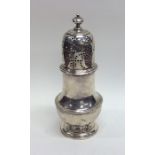 A good Georgian silver baluster shaped sugar caste