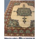 An Antique tapestry Oriental rug in bright colours