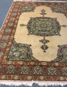 An Antique tapestry Oriental rug in bright colours