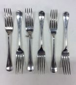 A heavy set of six rat tail pattern silver table f