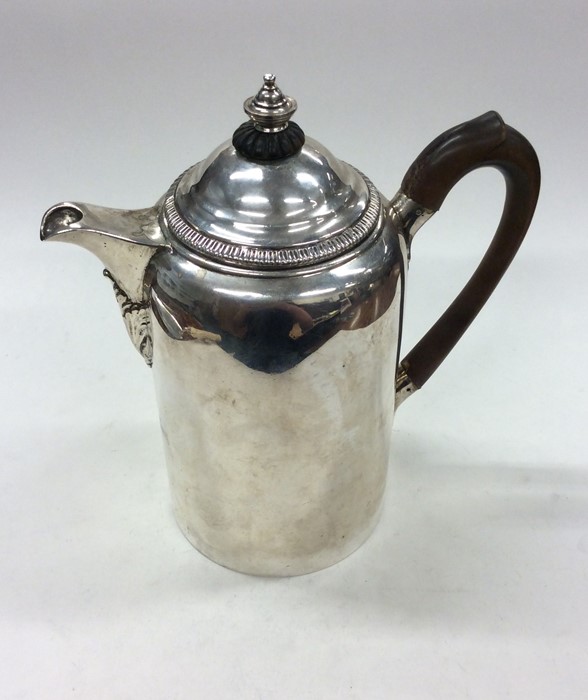 A good Georgian Irish silver water jug with creste