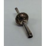A Chinese silver rattle engraved with lettering. A