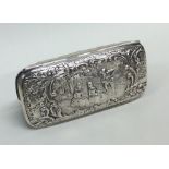A rectangular embossed silver purse decorated with