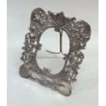 An Antique Japanese silver frame decorated with bi