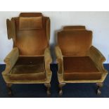 A pair of Georgian style upholstered armchairs on