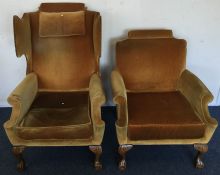 A pair of Georgian style upholstered armchairs on