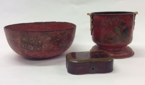 A red lacquer jardiniere together with a papier-mâ