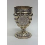 An unusual Continental silver gilt cup on tapering