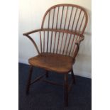 A good Antique oak bow back kitchen chair with str