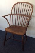 A good Antique oak bow back kitchen chair with str