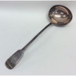 A heavy silver fiddle pattern soup ladle. London.