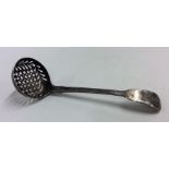 A Georgian silver fiddle pattern sifter spoon. Lon