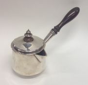 A Georgian silver brandy pan with hinged top and t