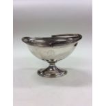 A Georgian silver sugar bowl with reeded rim and c