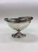 A Georgian silver sugar bowl with reeded rim and c