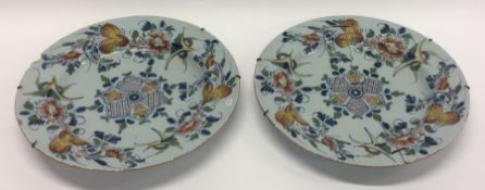 A pair of 18th Century English Delft wall chargers