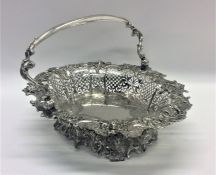 A good quality cast silver George II swing handled