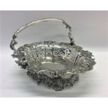 A good quality cast silver George II swing handled