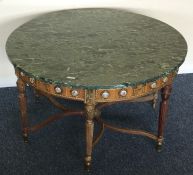 A large circular Continental marble topped occasio