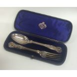 A cased silver Kings' pattern two piece christenin