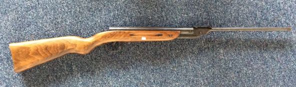 A 188 mahogany mounted air rifle. Est. £30 - £50.