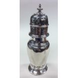 An Adams' style silver sugar caster with lift-off