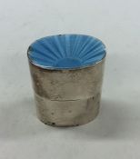 A good silver and enamelled slip top box with engi