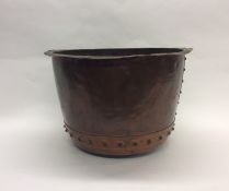 A large brass log box. Approx. 54 cms in diameter.