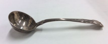 A Kings' pattern silver sauce ladle. London. By GA