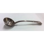 A Kings' pattern silver sauce ladle. London. By GA