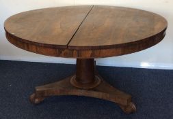 A good rosewood tilt-top Loo table on tapering bas