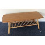 ERCOL: A small occasional table on tapering suppor