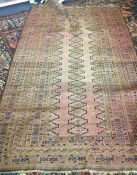 A large Oriental rug of rectangular form. Approx.